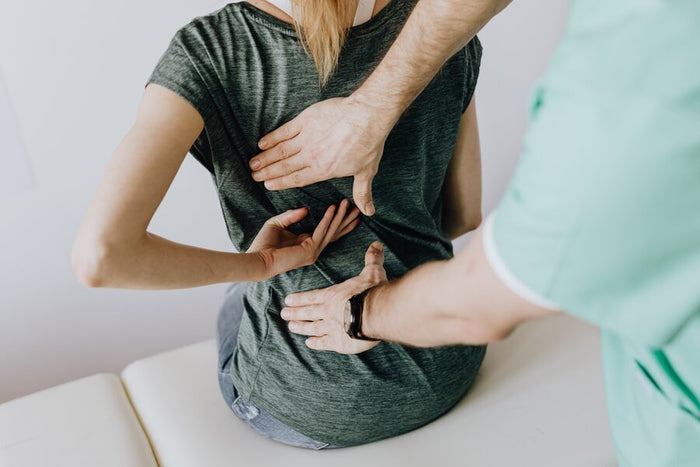 5 Tips to Relieve Lower Back Pain When Standing | MotionGrey
