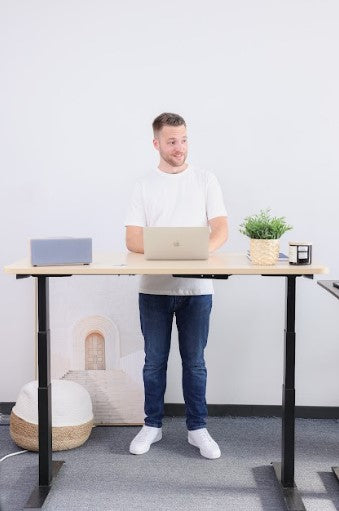 Back Pain from Standing at Work with an Ergonomic Standing Desk: Am I Standing too Much?