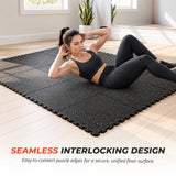 Interlocking gym flooring tiles joined into a workout surface for floor exercises.