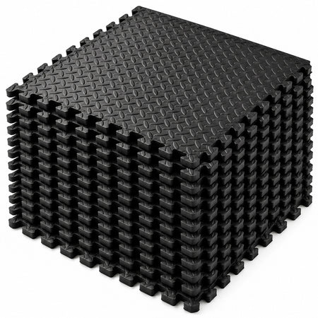 MotionGrey plain black EVA foam gym flooring mat, stack of twelve interlocking tiles with raised tread texture.