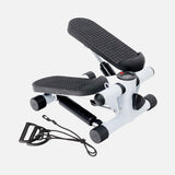 White mini elliptical stepper with black pedals and resistance bands