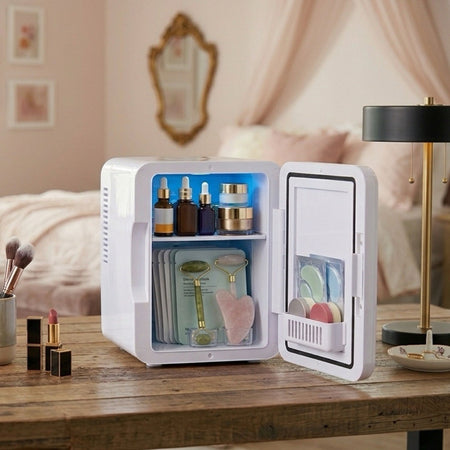 Open mini fridge storing skincare products on a bedroom vanity