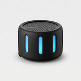 A black cylindrical portable speaker with vertical blue LED light accents, shown on a light gray background.