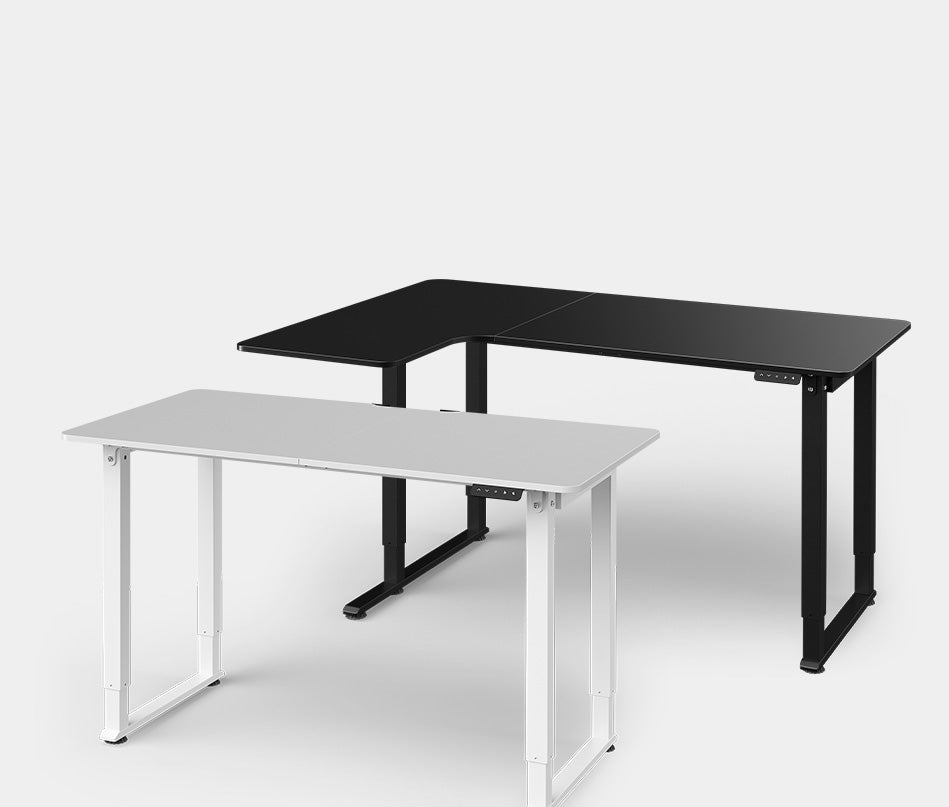 Electric standing desks in white and black