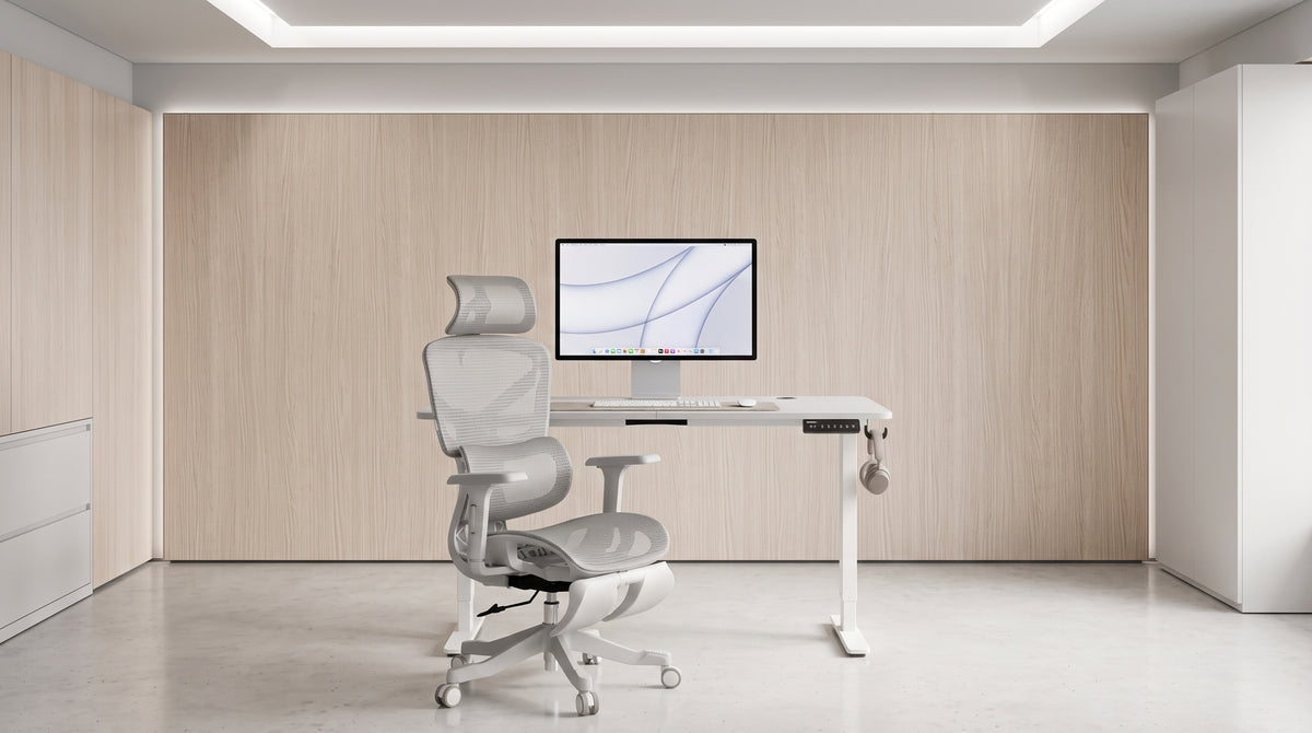 White ProMesh chair at a white standing desk in a modern home office