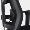 Close-up of the office chair adjustable lumbar support mechanism